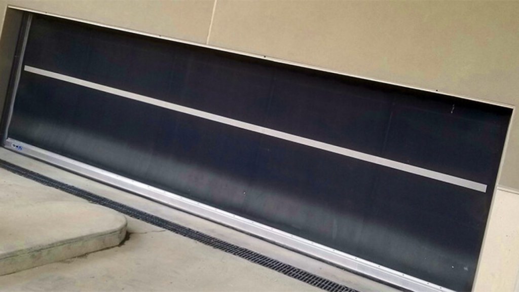 Picture of: Springless Garage Door – Top Of The Line Assistance